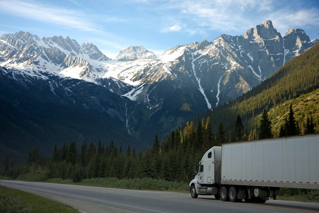 Freight truck passing through the mountains